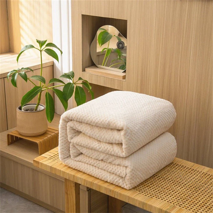 sherpa blanket on the bed