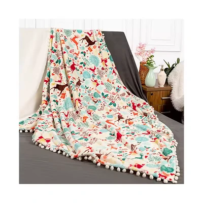 POM POMs کے ساتھ کرسمس آلیشان کمبل